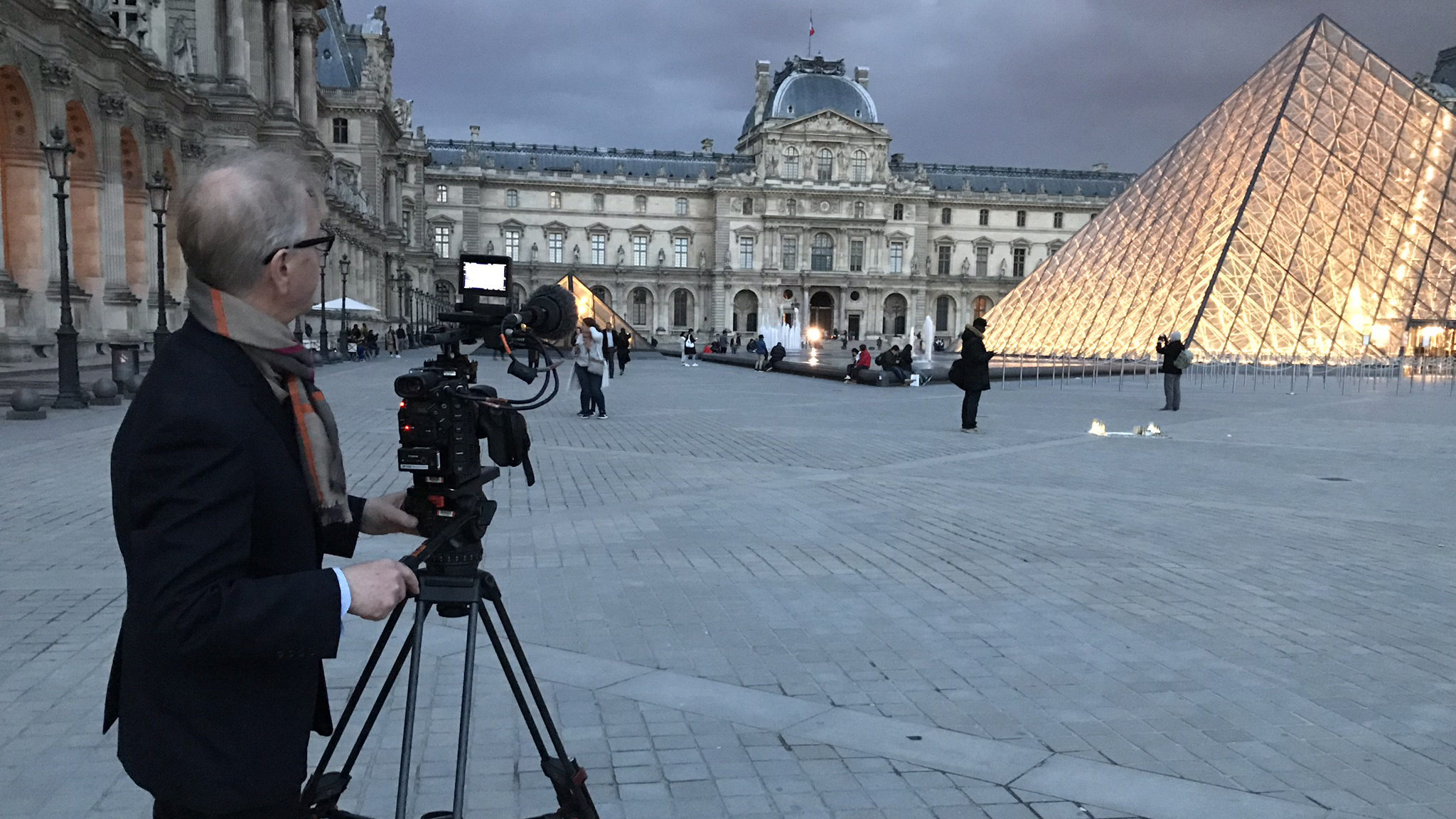 Hugh Hood filming EASTER IN ART at the Louvre exterior © EXHIBITION ON SCREEN